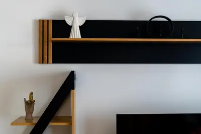 a room with a shelf with a cross on it at Wiślane Tarasy 2 0 Modern Space Studio by BookingHost in Kraków