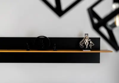 a shelf with a figurine of a woman on it at Wiślane Tarasy 2 0 Modern Space Studio by BookingHost in Kraków