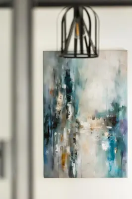 a picture of a painting on a wall at Berka 12 - Quiet Two-Level Apartment in Kraków