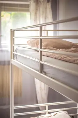 a couple of bunk beds in a room at 4Friends&4Couples in Kraków