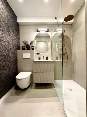 a bathroom with a toilet and a mirror at Way2Stay Kazimierz in Kraków