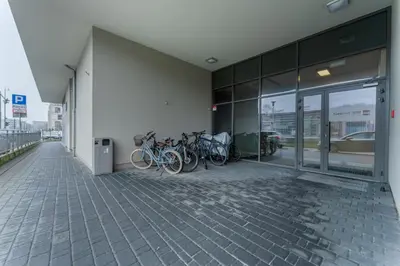 a group of bikes parked on the side of a building at Siewna Homely Apartment in Kraków