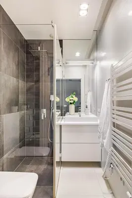 a bathroom with a shower and a toilet and a sink at Old Town Apt with AC & Parking, 5 min Main Sq & Kazimierz in Kraków