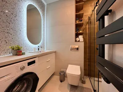 a bathroom with a toilet and a shower at Quiet & Stylish Apartment in Old Town 3min from Main Station in Kraków