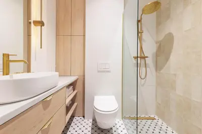 a bathroom with a toilet and a sink and a shower at Pawlikowskiego 12 by Homeprime in Kraków