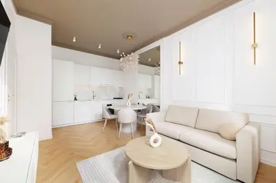 a living room with a white couch and a table at Pawlikowskiego 12 by Homeprime in Kraków