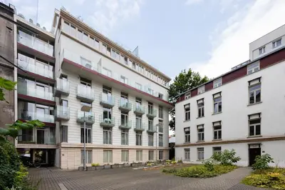 an apartment building in the middle of two buildings at Sunny 2B apartment in City Centre in Kraków