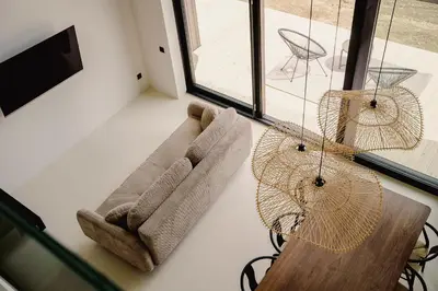 a living room with a couch and a table at Vidok House