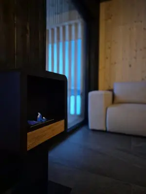 a television in a living room with a couch at Stodoła na Hamajdówce in Zubrzyca Górna