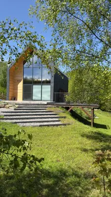 a building with a picnic table and a bench at MC Na Leśnej Polanie in Szczawa