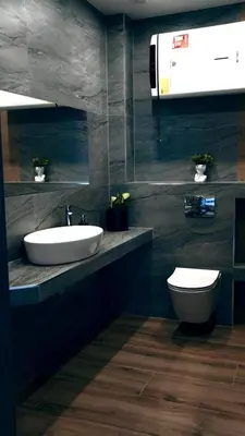 a bathroom with a sink and a toilet at Domki Leśne Zacisze in Baczyn
