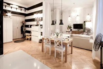 a living room with a table and a couch at MAGICAL apartment in Kraków