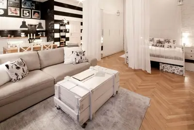 a living room with a couch and a table at MAGICAL apartment in Kraków