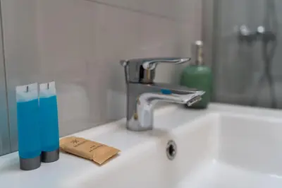 a bathroom sink with a faucet and a toothbrush at Halicka 5 Superior Studio by BookingHost in Kraków
