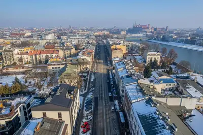 an aerial view of a city with snow covered buildings at Kościuszki Apartment N1 - AirCon - by Rentujemy in Kraków