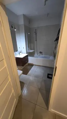 a bathroom with a tub and a toilet and a sink at Odpoczynek w Parku, Free Parking!! in Kraków