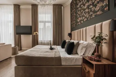 a bedroom with a large bed in a room at White Lotus by Fragola Apartments in Kraków