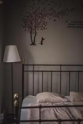 a reflection of two bunk beds in a mirror at 4 Couples Hostel in Kraków