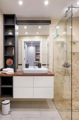a bathroom with a sink and a shower at Unique riverside treasure in Kraków