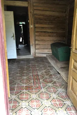 an empty room with a tile floor and a door at Holiday Home mit Wasserblick by Interhome in Kraków