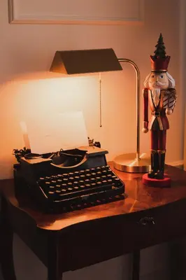 a desk with a computer keyboard and a lamp at QUEEN #2 APARTMENT, WAWEL VIEW, OLD TOWN, Kraków in Kraków