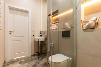 a kitchen with white cabinets and a sink at Perfect Apartment in the Old Town 5min Market Square AC WiFi Parking in Kraków