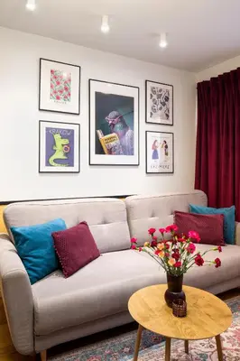 a living room with a couch and a table at Tomasza 25 Apartment 2 in Kraków