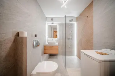 a bathroom with a shower and a toilet and a sink at Łagiewniki Apt - 52 m2, Workspace - by Rentujemy in Kraków