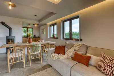 a living room with a couch and a table at La Nostra Villa in Zator