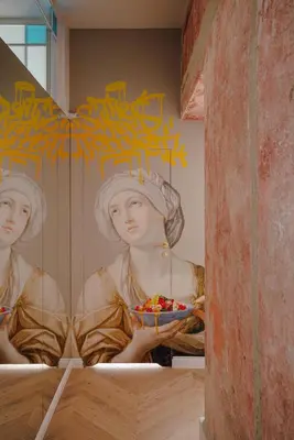 a painting of two women with a bowl of fruit at Imaginibus by MB Apartments in Kraków
