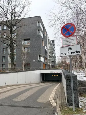 a street sign in front of a tunnel at Apartament Rakowicka in Kraków