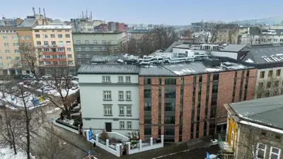 an aerial view of a city with buildings at Wawel Kossak Residence Loft Studio by BookingHost in Kraków