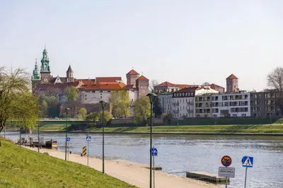 a view of a city with a river and buildings at Atmospheric Apartment with Ideal Location in Cracow by Noclegi Renters in Kraków
