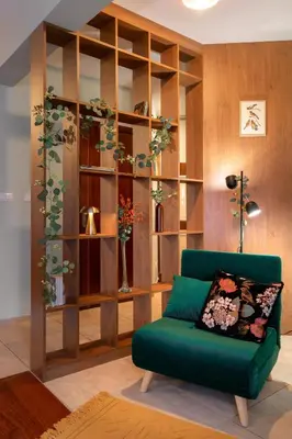 a living room with a couch and a kitchen at Malila Premium Apartments Cracow Pułaskiego 14 in Kraków