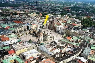an aerial view of a city with buildings at Let's go back to the memories in Kraków