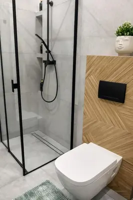 a bedroom with a bed and a cabinet at Apartament Paoli 2 in Zator
