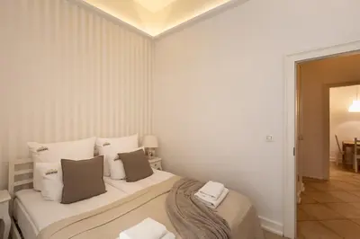 a bathroom with a shower and a sink at Old Town św Jana by Downtown Apartments in Kraków