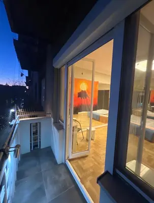 a room with a view of a balcony with a window at 5 min from city center by feet in Kraków