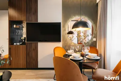 a kitchen with a sink and a counter top at Smolensk Loft Suite - homfi Collection in Kraków