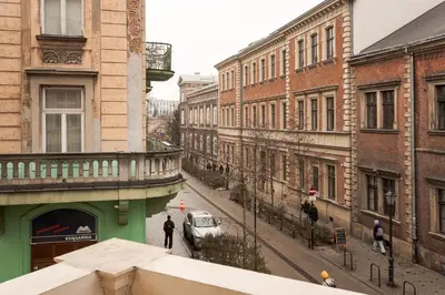 a view of a street in a city with buildings at Krupnicza 12 in Kraków