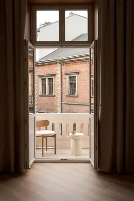an open door with a view of a room at Krupnicza 12 in Kraków