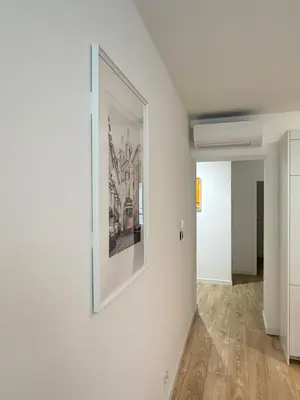 a painting on a white wall in a room at Rakowicka Krakow City Center Premium Apartment with Balcony near Main Station in Kraków