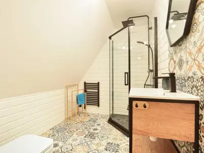 a bathroom with a shower and a sink and a toilet at Zawoja domek do wynajęcia in Zawoja