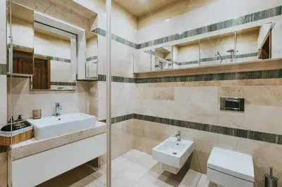 a bathroom with a sink and a toilet at Bogoria House in Kraków