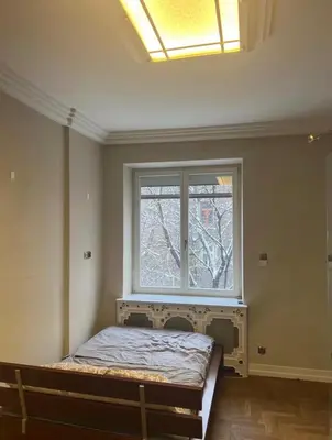 a bathroom with a shower and a toilet and a sink at Affordable place in city center in Kraków