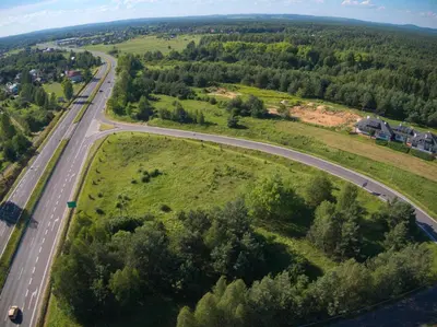 an aerial view of a road in a field at Zajazd Maj in Bolesław