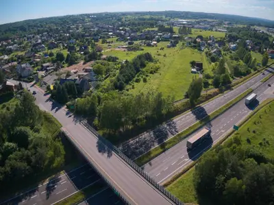 an aerial view of a city with a highway at Zajazd Maj in Bolesław