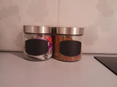 two jars filled with food sitting on top of a counter at Old Town Premium Apartment Kazimierz - Synagogue view in Kraków