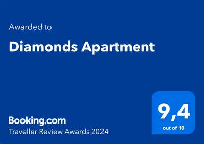 a blue sign with the words diamonds appointment at Diamonds Apartment in Kraków