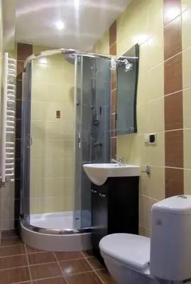 a bathroom with a shower and a toilet and a sink at Gospodarstwo Agroturystyczne Watra in Koninki